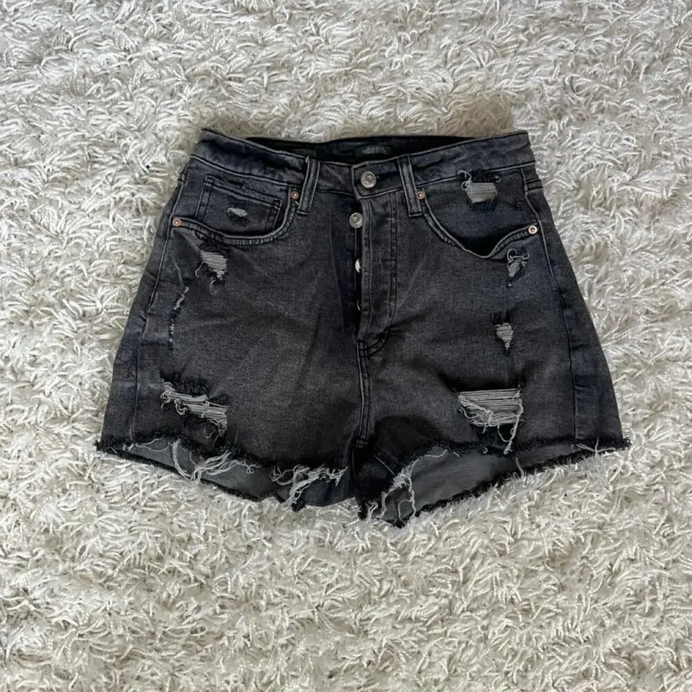 Black denim shorts with distressed